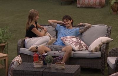 Houseguests Rylie Jeffries and Katherine Woodman in a romantic moment on Big Brother 27 USA.