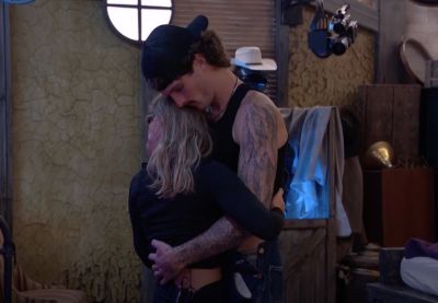 Houseguests Rylie Jeffries and Katherine Woodman in a romantic moment on Big Brother 27 USA.