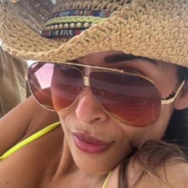 Malaika Arora in a yellow bikini on the beach