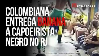 Turista colombiana dá uma banana a capoeirista negro no Rio de Janeiro